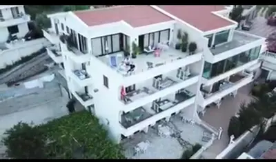 an aerial view of a white apartment building at Apartments Plaza in Ulcinj