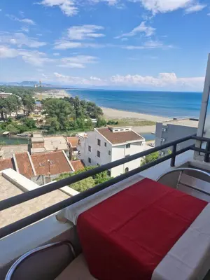a balcony with a view of the ocean at Apartments Plaza in Ulcinj