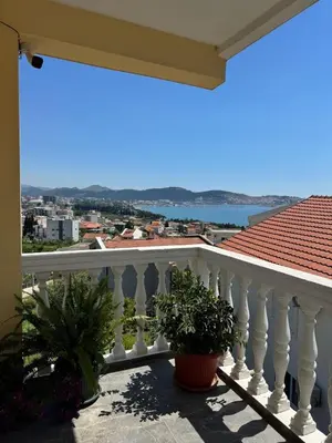 a balcony with a view of the ocean at LazArina Apartments in Bar