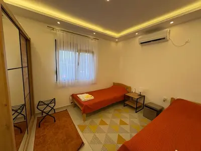 a small room with a bed and a window at Luxury Villa Ulcinj Štoj in Donji Štoj