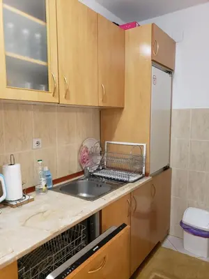 a kitchen with a sink and a counter top at Отдых с комфортом и близко к морю in Bar, Susanj