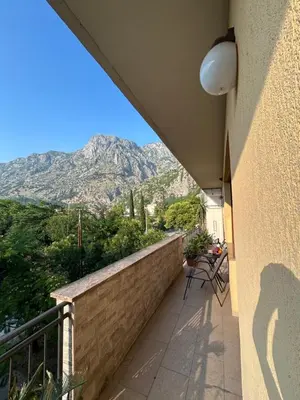 a balcony with a view of a mountain at Central Kotor Bay Condo with amazing view in Kotor