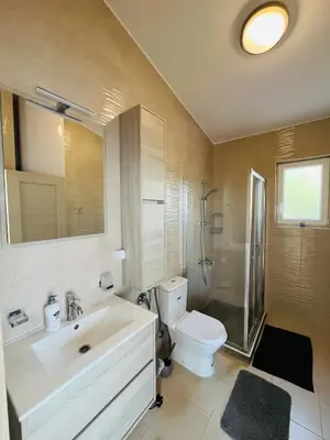 a bathroom with a sink and a toilet at Villa Sky Mountain in Bar