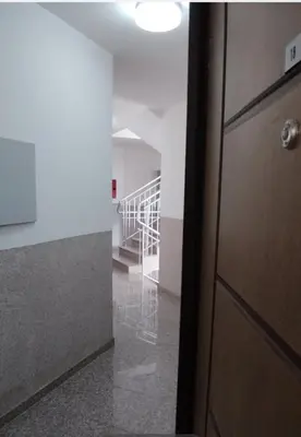 an empty hallway with a staircase in a building at Apartments Lučijana in Budva