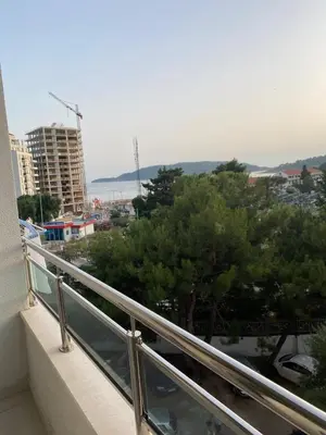 a balcony with a view of a city at Montesin cozy studio in Budva