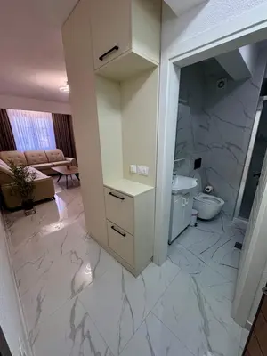 a bathroom with a sink and a toilet at Apartment AB in Bar