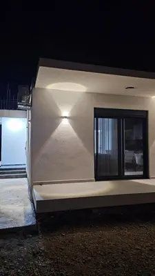 a building with a window on the side of it at Apartments Liards in Ulcinj