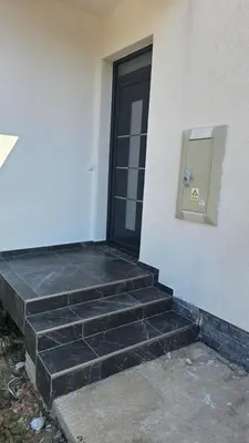 a set of steps leading up to a door at Apartments Liards in Ulcinj