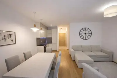 a living room with a couch and a table at Libertina Rafailovici in Rafailovici