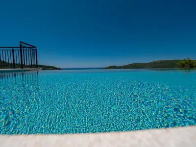a view of a large body of blue water at Villa Zvis Sea View with Private Pool & Peaceful Stay in Budva