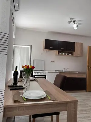 a kitchen with a table with a plate on it at Apartment Matija in Cetinje