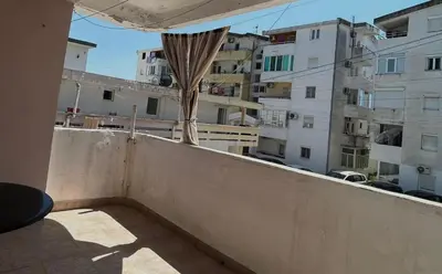 a balcony with a view of some buildings at Seaside Ilino in Bar