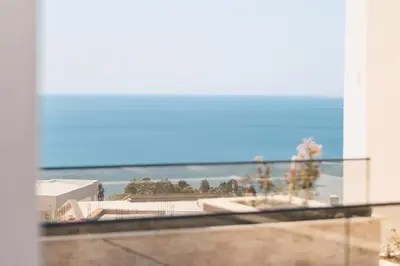 a view of the ocean from a balcony at Dani Deluxe Apartments in Ulcinj