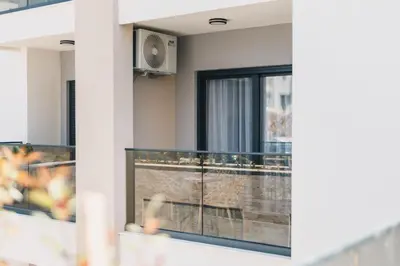 a balcony with a view of a building at Dani Deluxe Apartments in Ulcinj