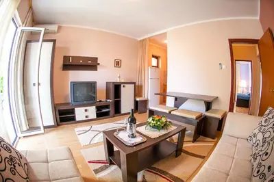 a living room with a couch and a table at Lidia Apartments in Budva