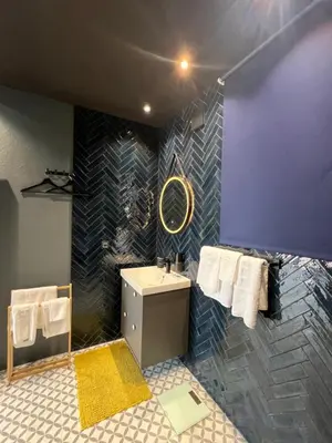 a bathroom with a sink and a mirror at Sunny Apart in Budva