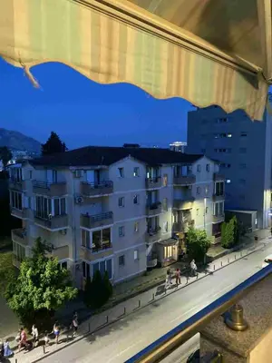 a view of a building from a window at Budva in Budva