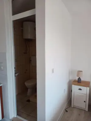 a bathroom with a toilet and a sink at Suzana in Ulcinj