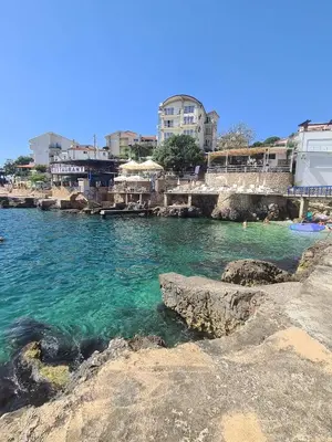 a body of water with buildings in the background at MiLA - Hladna Uvala in Utjeha
