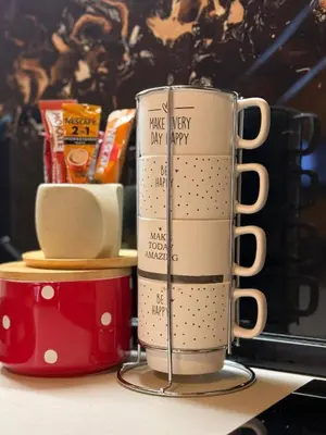 two coffee cups sitting on top of a table at Mountain harmony Lovćen in Cetinje