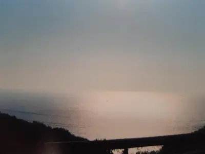 a view of the ocean from the top of a hill at Kruce accommodation in Ulcinj