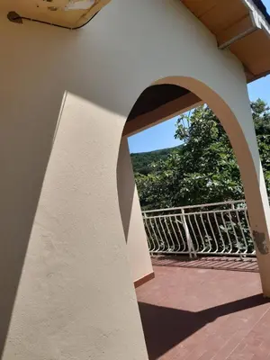 a view from the outside of a building with an archway at Kruce accommodation in Ulcinj