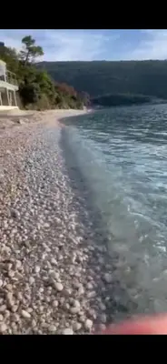 a view of a rocky beach with the water at Kruce accommodation in Ulcinj