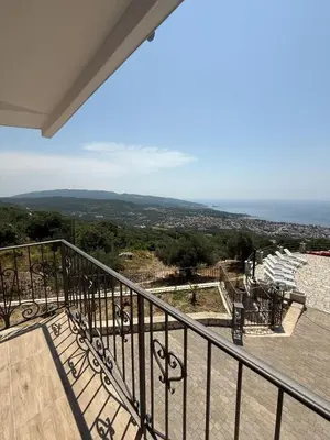 a balcony with a view of the ocean at Salakovic Country Estate in Bar