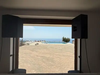 a room with a door open to a view of a pool at Salakovic Country Estate in Bar