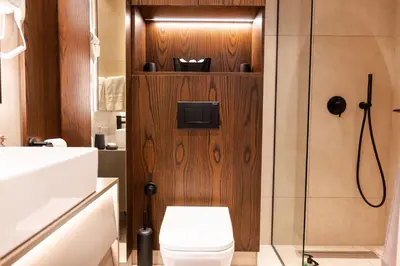 a bathroom with a toilet and a shower at Apartman Katica in Becici