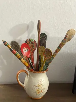 a cup filled with different types ofoons and spatulas at Iskra house - Perazica Do in Perazića Do