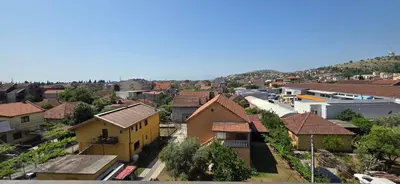 an overhead view of a town with houses and buildings at KASIJA Apartman in Podgorica