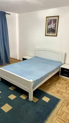 a bed in a room with a blue mattress at Adria spa Rafailovici in Becici