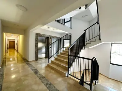 a staircase in a house with black railings at Harmony Sun 39 in Bar