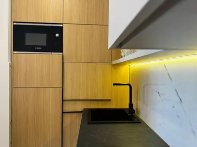 a kitchen with a counter top with a microwave at Harmony Sun 39 in Bar