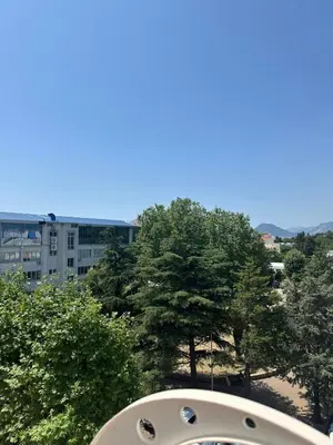 a view of trees and buildings in a city at Tara in Bar