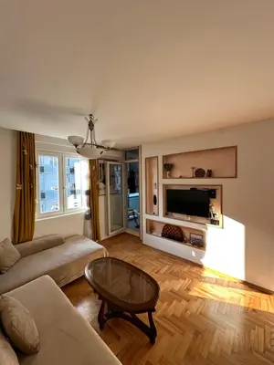 a living room with a couch and a table at Dubovica Hill in Budva