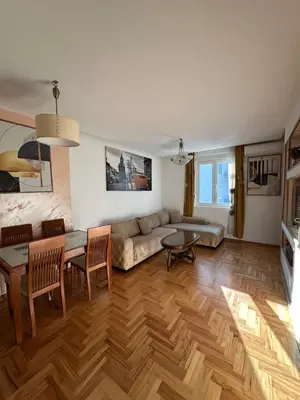 a living room with a couch and a table at Dubovica Hill in Budva