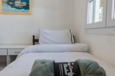 a bedroom with a bed and a window at Holiday Home Soul