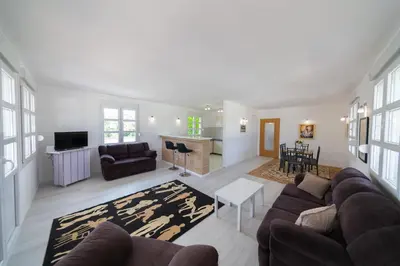 a living room with a couch and a table at Holiday Home Soul