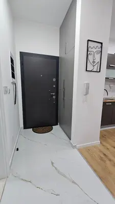 a hallway with a black door in a room at Lux Star in Ulcinj