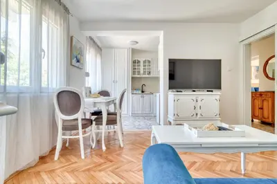 a living room with a couch and a table at Apartment Seaside in Kotor