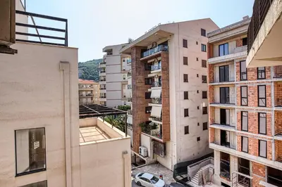 an aerial view of buildings in a city at Cihan Apartment in Budva