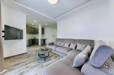 a living room with a couch and a table at Villa Blue Haven in Ulcinj