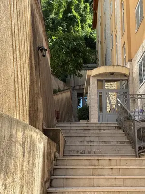 a set of stairs in front of a building at Comfortable family apartments in Przno in Pržno