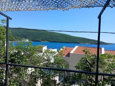a view from a balcony with a view of the water at MonaLiza in Ulcinj