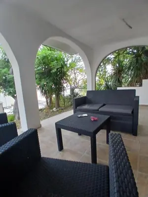 a living room with couches and a coffee table at MonaLiza in Ulcinj