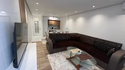 a living room with a couch and a table at Sea&Sun Living in Ulcinj