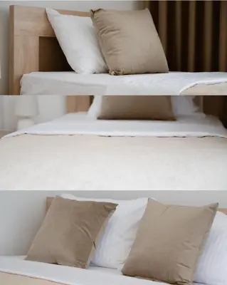 two different views of two beds with pillows at Sea&Sun Living in Ulcinj
