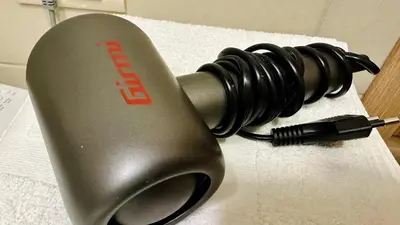 a hair dryer sitting on top of a table at Central Station Apartments in Podgorica
